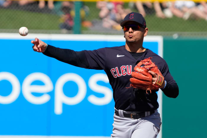 Mar 4, 2023; Mesa, Arizona, USA; Cleveland Guardians second baseman Andres Gimenez (0) makes the play for an out against the Oakland Athletics in the first inning at Hohokam Stadium. Mandatory Credit: Rick Scuteri-USA TODAY Sports